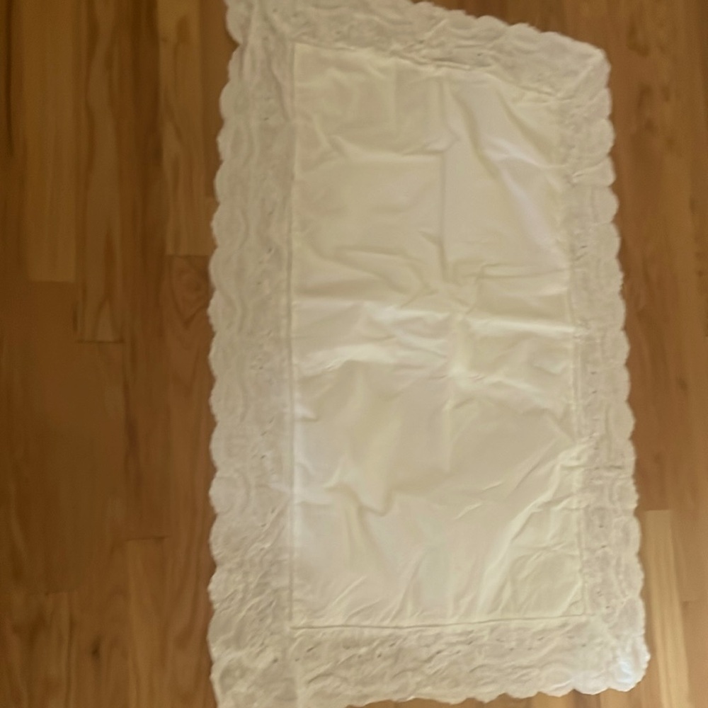 Two white king size pillow shams with lace trim